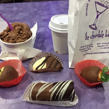 Winfield's Chocolate Bar - A cup of Orange Sunrise ice cream and assorted chocolate-covered fruits, together with a cup of hot cocoa. - Desserts Near Me - Houston, Texas