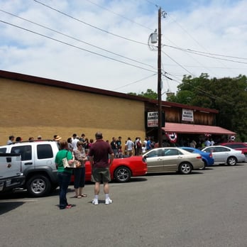 Black's Barbecue Lockhart - The long ass line going over a block on July 4th! They are the only one open that day! - Barbeque Near Me - Lockhart, Texas