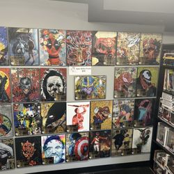 Tatertot Comics and Collectibles - Our Wall of Art Prints!