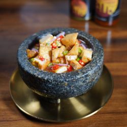 Krakatoa Indonesian Cuisine - Tahu Gejrot
Fried tofu with spicy shallots, garlic, tamarind sauce and palm sugar. Incredible tangy sweetness and with a little sambal kick