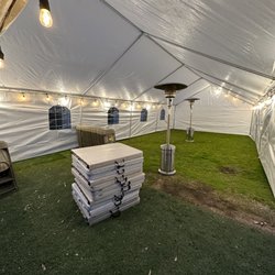 Mambo Jumpers - 20x40 tent with lighting, tables, chairs, and heaters