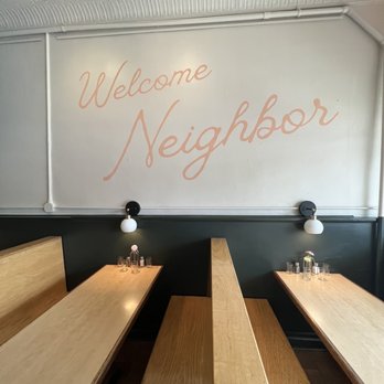 Neighbor - a row of benches in front of a welcome sign - Comfort Food Near Me - Richmond, Virginia Neighbor - a row of benches in front of a welcome sign - Comfort Food Near Me - Richmond, Virginia