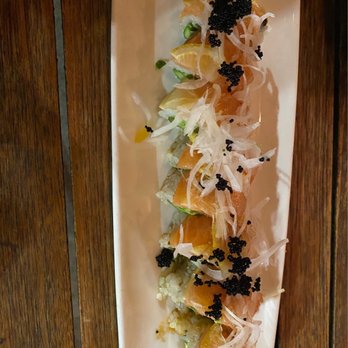 Maru Sushi - a long rectangular plate of food on a wooden table - Sushi Bars Near Me - Westminster, California