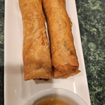 Pho 7 - two fried spring rolls on a plate with dipping sauce - Vietnamese Near Me - Kent, Washington
