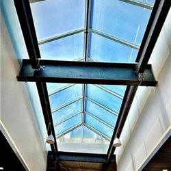 TGC Glass Coatings Window Innovations - Skylight transformation by Window Innovations. Professional tinting for improved aesthetics and efficiency. Contact us today!