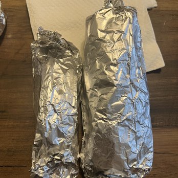 Taqueria El Crucero - Taco shown next to a burrito for size comparison - Mexican Near Me - Waco, Texas Taqueria El Crucero - Taco shown next to a burrito for size comparison - Mexican Near Me - Waco, Texas