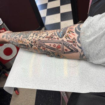 Genuine Electric Tattoo - My husband's tattoos (all from Wyatt except the tribal) - Tattoo Near Me - Valley Glen, California