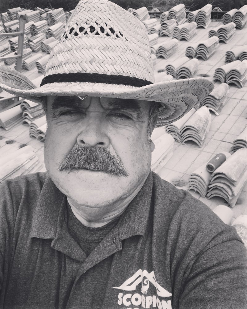 Slide of Scorpion Roofing