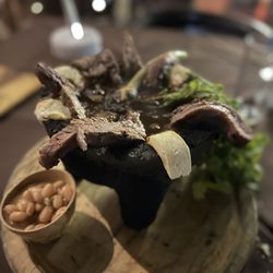 Santo Cielo - Arrachera molcajete- salsa was ok but very spicy. Beans overly salty.