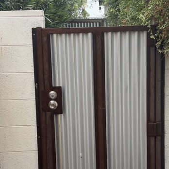 Under the Sun Fabrication - Gate with a lock - Metal Fabricators Near Me Under the Sun Fabrication - Gate with a lock - Metal Fabricators Near Me