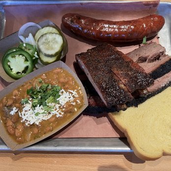 Hurtado Barbecue - The Texas Trinity: 1/3 lb each of spare ribs, brisket, and, sausage with side of Brisket Beans - PHENOMENAL BBQ SPOT! (08/14/25) - Barbeque Near Me - Dallas, Texas Hurtado Barbecue - The Texas Trinity: 1/3 lb each of spare ribs, brisket, and, sausage with side of Brisket Beans - PHENOMENAL BBQ SPOT! (08/14/25) - Barbeque Near Me - Dallas, Texas