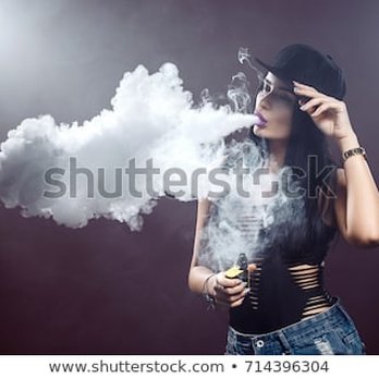 Phillip66 - Lake Geneva - a woman smoking a cigarette - Convenience Stores Near Me - Lake Geneva, Wisconsin Phillip66 - Lake Geneva - a woman smoking a cigarette - Convenience Stores Near Me - Lake Geneva, Wisconsin