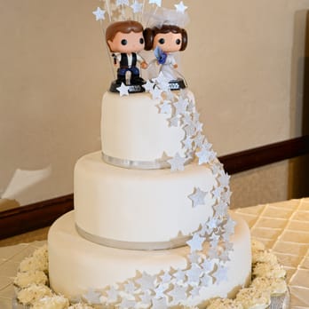 Hey Sugar Cupcakes - We make wedding cakes! Shown is a custom round, 3-tier cake with fondant, cupcake border, ribbon edge, custom star decor and Star Wars them - Bakeries Near Me - Weston, Florida Hey Sugar Cupcakes - We make wedding cakes! Shown is a custom round, 3-tier cake with fondant, cupcake border, ribbon edge, custom star decor and Star Wars them - Bakeries Near Me - Weston, Florida