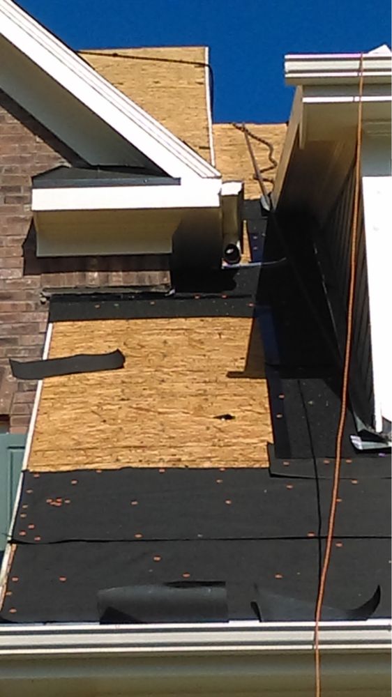 Slide of Goliath Roofing