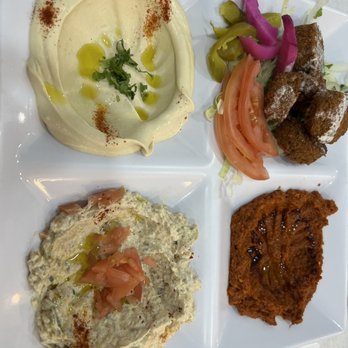 Al Sham Restaurant - Mix Appetizer - Falafel, babaganoush, hummus, and a red pepper dip - Middle Eastern Near Me - Astoria, New York Al Sham Restaurant - Mix Appetizer - Falafel, babaganoush, hummus, and a red pepper dip - Middle Eastern Near Me - Astoria, New York
