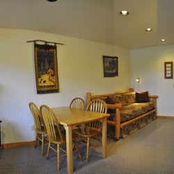 Glacier Outdoor Center Cabins - Standard One Bedroom Living Room and Dining Room