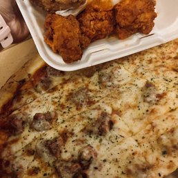 Half cheese/half sausage pizza and chicken wings (half plain/half Buffalo) Half cheese/half sausage pizza and chicken wings (half plain/half Buffalo)