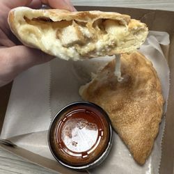 The Dough Company - The Chicken Parmesan calzone with marinara.