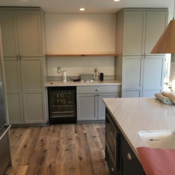 Carmel Valley Contracting - a kitchen with stainless steel appliances - General Contractors Near Me - Del Mar, California