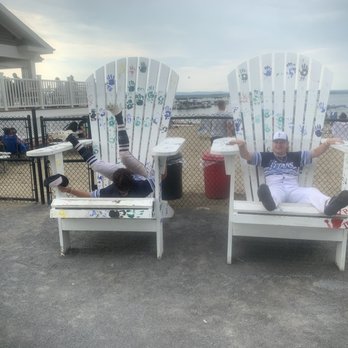 Dock Brown's - Big chairs outside and two chuckle heads - Burgers Near Me - Saratoga Springs, New York