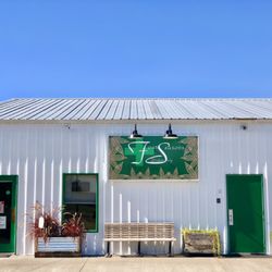 Four Seasons Dispensary - Front door to left, view from parking lot and Oakville Rd N