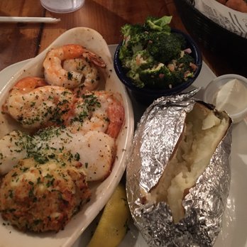 Miller's Waterfront Restaurant - Trawl Boat with Baked Potato and Broccoli Salad - Seafood Near Me - Nags Head, North Carolina Miller's Waterfront Restaurant - Trawl Boat with Baked Potato and Broccoli Salad - Seafood Near Me - Nags Head, North Carolina