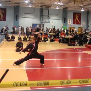 Universal Kempo Club - Team Relentless, view of the tournament floor with forms competition - Self-defense Classes Near Me - Rochester, New York Universal Kempo Club - Team Relentless, view of the tournament floor with forms competition - Self-defense Classes Near Me - Rochester, New York