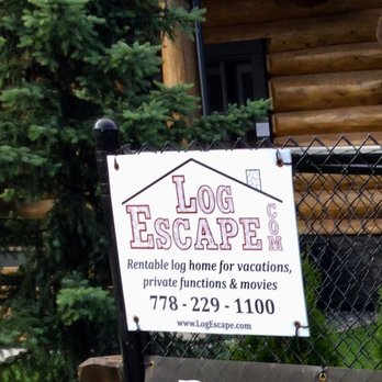 Log Escape - Closer look at the information signage on the property's fence. - Vacation Rentals Near Me - Harrison Hot Springs, British Columbia