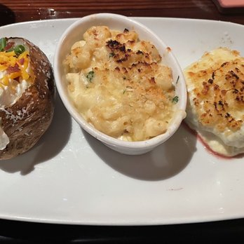 LongHorn Steakhouse - There is a steak here (on right covered with Parmesan Cheese Crust) - Steakhouses Near Me - Fredericksburg, Virginia LongHorn Steakhouse - There is a steak here (on right covered with Parmesan Cheese Crust) - Steakhouses Near Me - Fredericksburg, Virginia