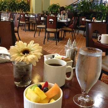 TableSouth Kitchen + Bar - Started off with coffee and a bowl of freshly cut fruit. - American Near Me - Durham, North Carolina