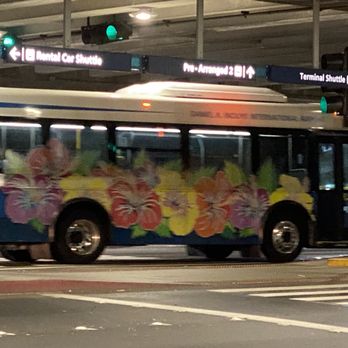 Wiki Wiki Shuttle - Wiki wiki shuttle heading to the terminal shuttle stop area - Airport Shuttles Near Me - Honolulu, Hawaii