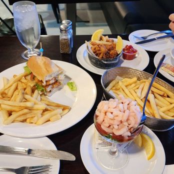 PK Oyster Bar - Shrimp Po Boy Sandwich with fries, shrimp cocktail, fried calamari with fries - Cajun/Creole Near Me - Las Vegas, Nevada PK Oyster Bar - Shrimp Po Boy Sandwich with fries, shrimp cocktail, fried calamari with fries - Cajun/Creole Near Me - Las Vegas, Nevada