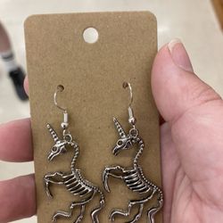 Unicorn skelly ear rings