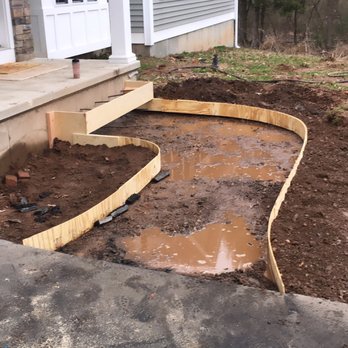JC Construction - the front of a house being built - General Contractors Near Me