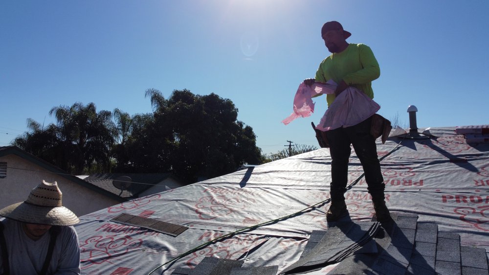 Slide of Home Town Roofing