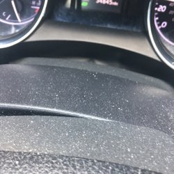 Avis Rental Car - Consul in front of steering wheel with flakes of god only knows what. Looked like dead skin