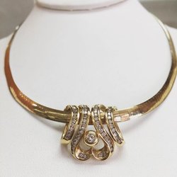An elegant omega with a diamond pendant all you need for date night! Get it at Luany Jewelers !