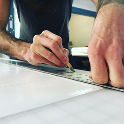 We do more than just design graphics & print garments! We also make banners and signs! You think up the idea and we can and make it happen!