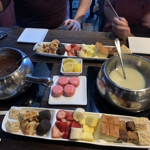 Photo of The Melting Pot - Oklahoma City, OK, United States. Dessert with candy bar and white chocolate fondue 5/25/21