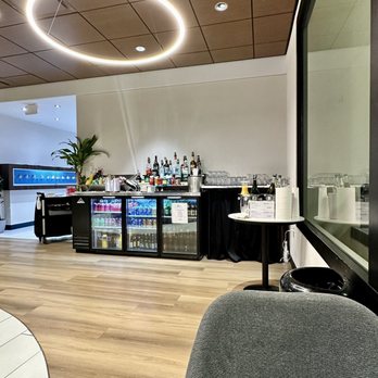 KLM Crown Lounge - Bar area. Attendants serve you - Airport Lounges Near Me - Houston, Texas KLM Crown Lounge - Bar area. Attendants serve you - Airport Lounges Near Me - Houston, Texas