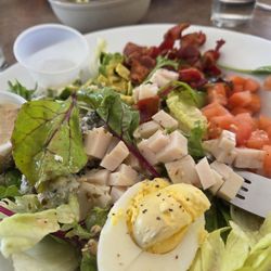 Tom's Restaurant - Cobb salad with bacon, egg, turkey,  Bleu cheese, avocado and greens.