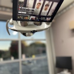 LuLu Dental  - Sit back, relax, and enjoy your favorite Netflix show while we take care of your smile--your comfort is our priority during every check-up!