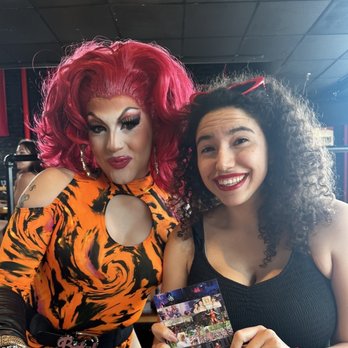The Social Bar + Kitchen - Drag Queen LaLa Wiggy (left) and me (right) cozying up at "Pink Eggs and Glam" brunch - New American Near Me - New London, Connecticut The Social Bar + Kitchen - Drag Queen LaLa Wiggy (left) and me (right) cozying up at "Pink Eggs and Glam" brunch - New American Near Me - New London, Connecticut