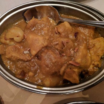 Mysore Fine Cuisine Indienne - a bowl of stew with a spoon in it - Indian Near Me - Montreal, Quebec Mysore Fine Cuisine Indienne - a bowl of stew with a spoon in it - Indian Near Me - Montreal, Quebec