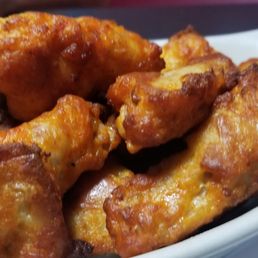 a plate of fried wings a plate of fried wings