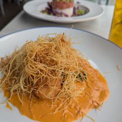 Sea Scallops with a cream sauce and crispy shredded phyllo