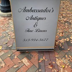 Ambassador’s Antique & Fine Linens - Sidewalk Welcome sign