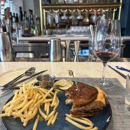 The Slip Burger with truffle fries! Also I had a glass of the Cab blend,Tre Leoni, which was awesome.