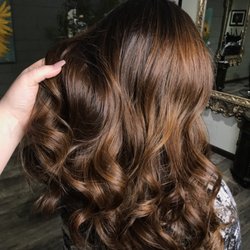 Kristina Rosario - Chocolate balayage with face framing, including a haircut with long layers for soft movement.