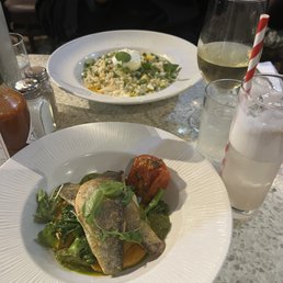 Top: Risotto "kedgeree" Bottom: Pan fried seabass Top: Risotto "kedgeree" Bottom: Pan fried seabass